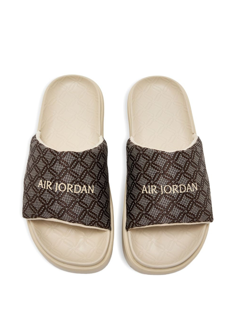 Nike monogram-pattern slides outlook