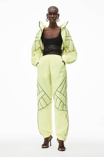 Alexander Wang SCULPTED PIPING TRACK SHRUG IN NYLON outlook