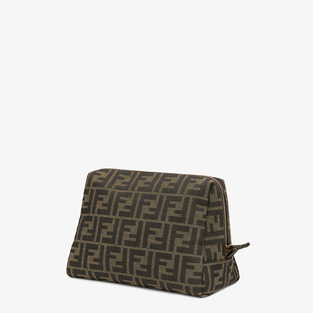 Medium toiletry case with zip fastening and inside pocket. Made of fabric with iconic brown jacquard - 2