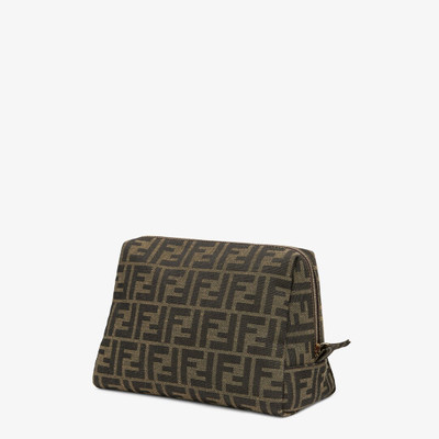 FENDI Medium toiletry case with zip fastening and inside pocket. Made of fabric with iconic brown jacquard outlook
