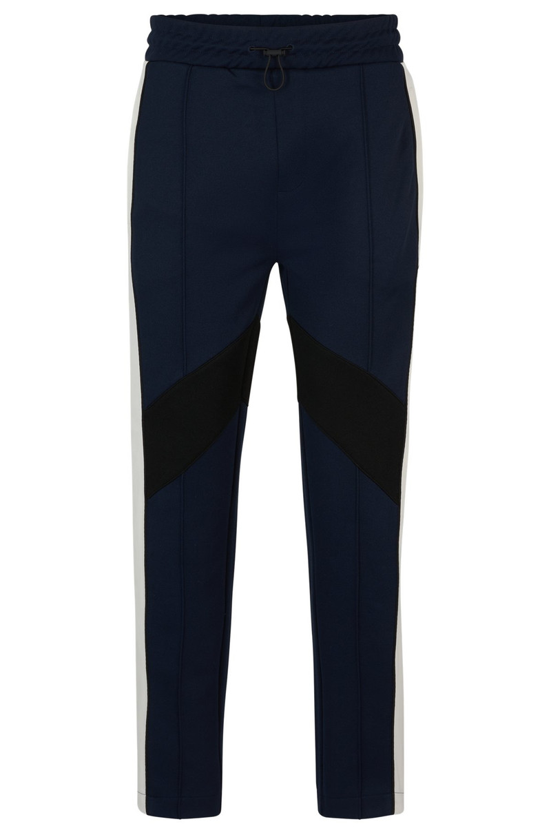 RELAXED-FIT TRACKSUIT BOTTOMS WITH COLOR-BLOCKING 1