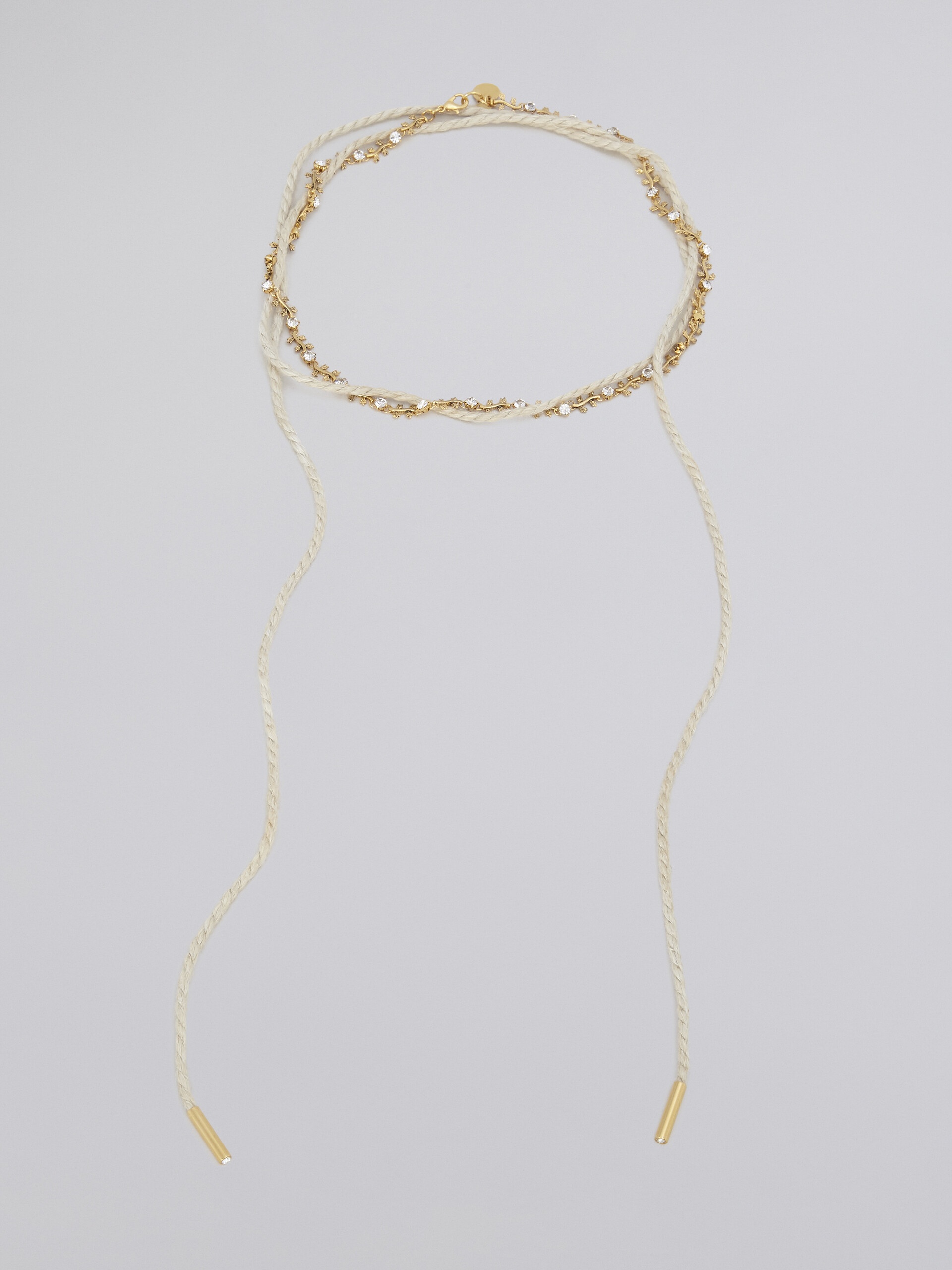 SET OF TWO FOUND BRASS NECKLACES - 1