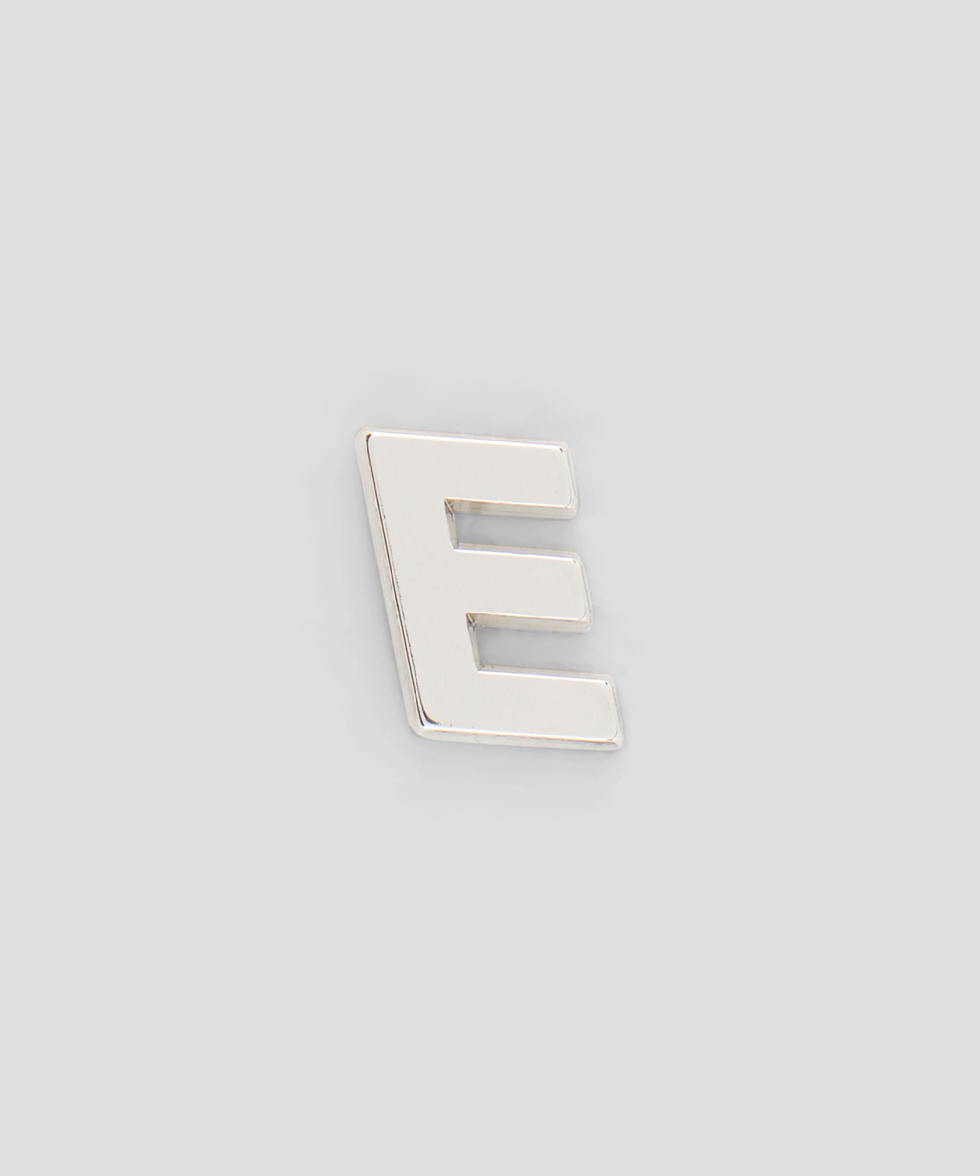 Single brass E charm - 1
