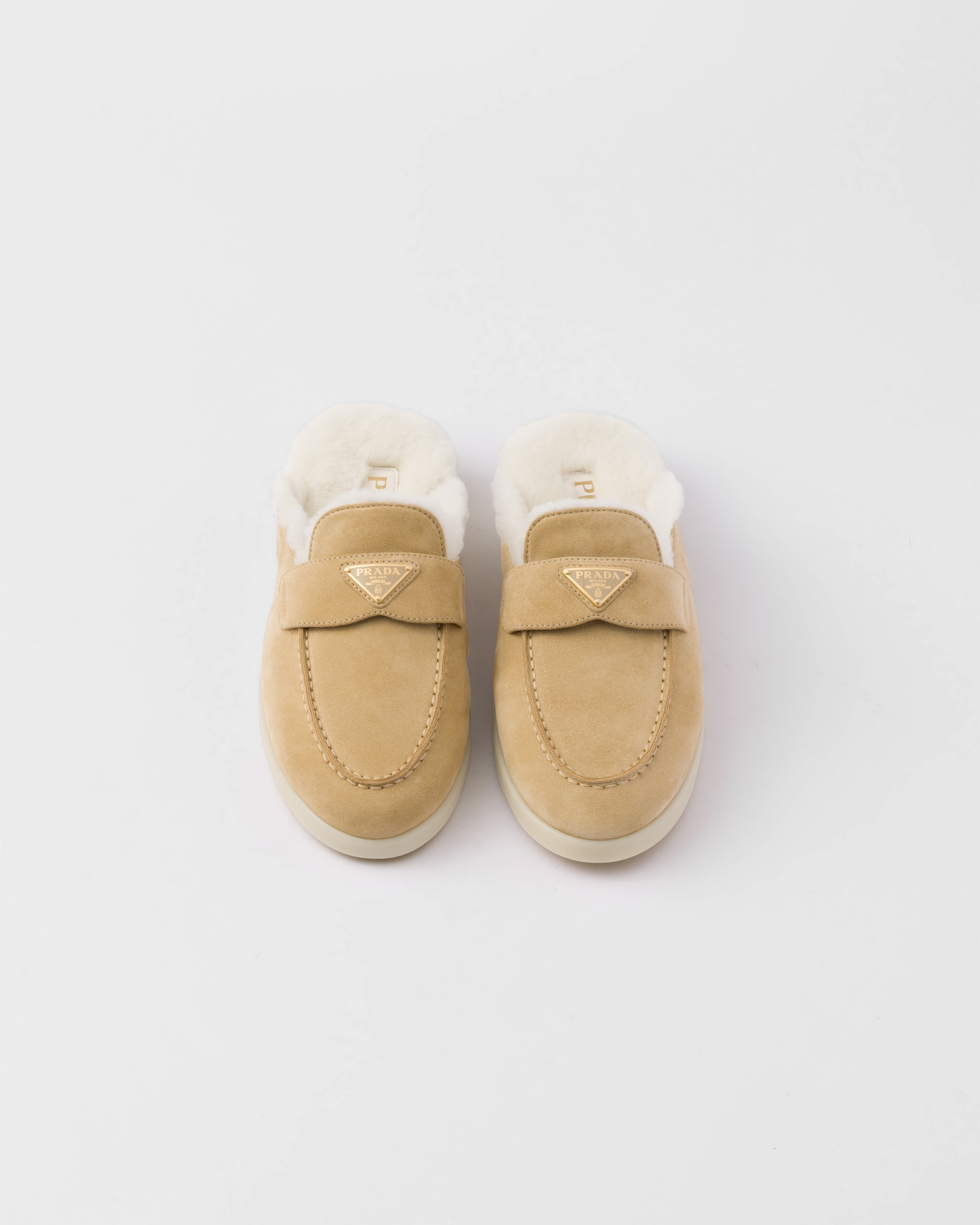 Prada Suede and shearling mules | REVERSIBLE