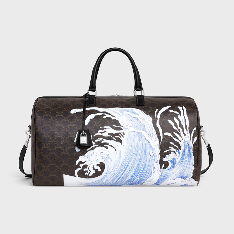 Large Voyage bag in Triomphe Canvas with David Weiss Wave Print 1