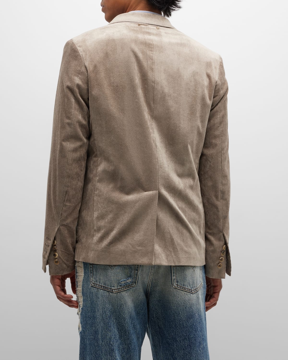 Sand-colored leather jacket with patches and zip fastening