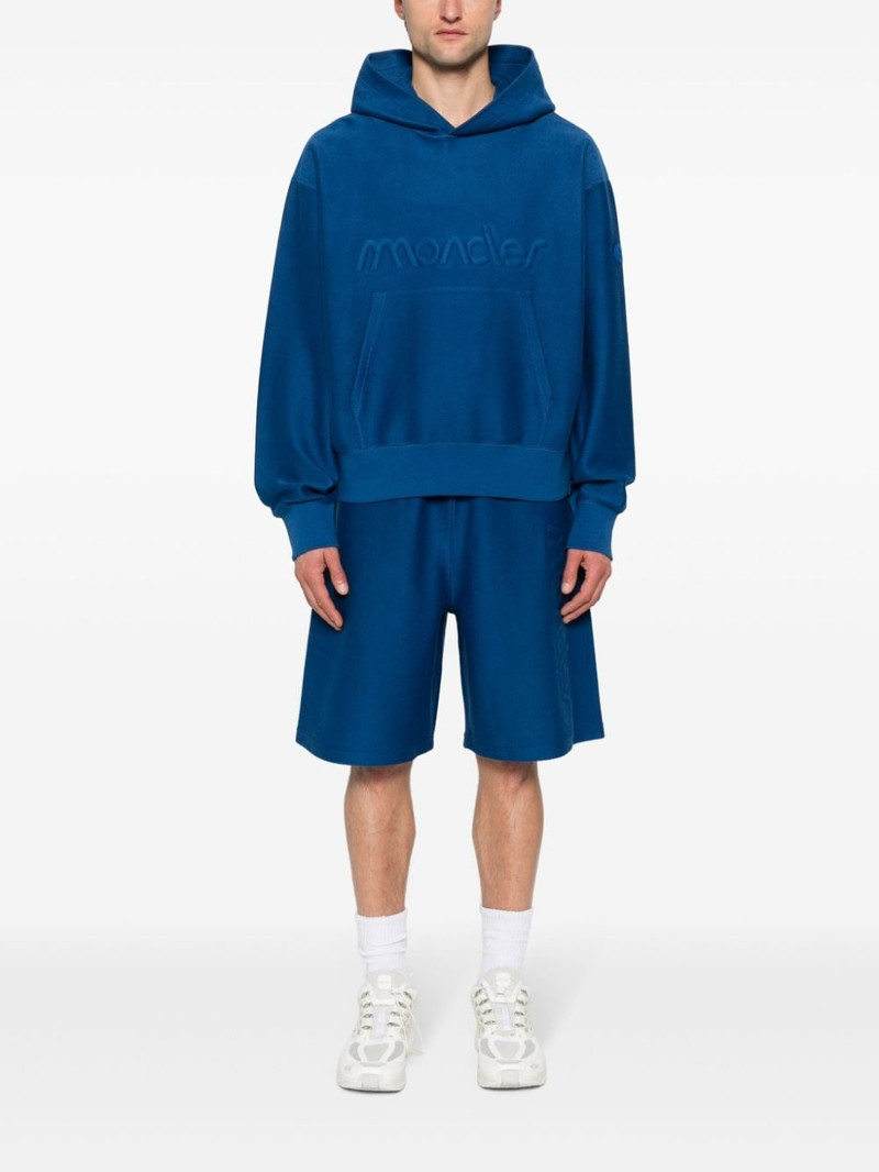 Moncler logo-embossed track shorts outlook
