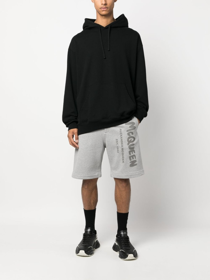 Alexander McQueen Graffiti-print track shorts outlook