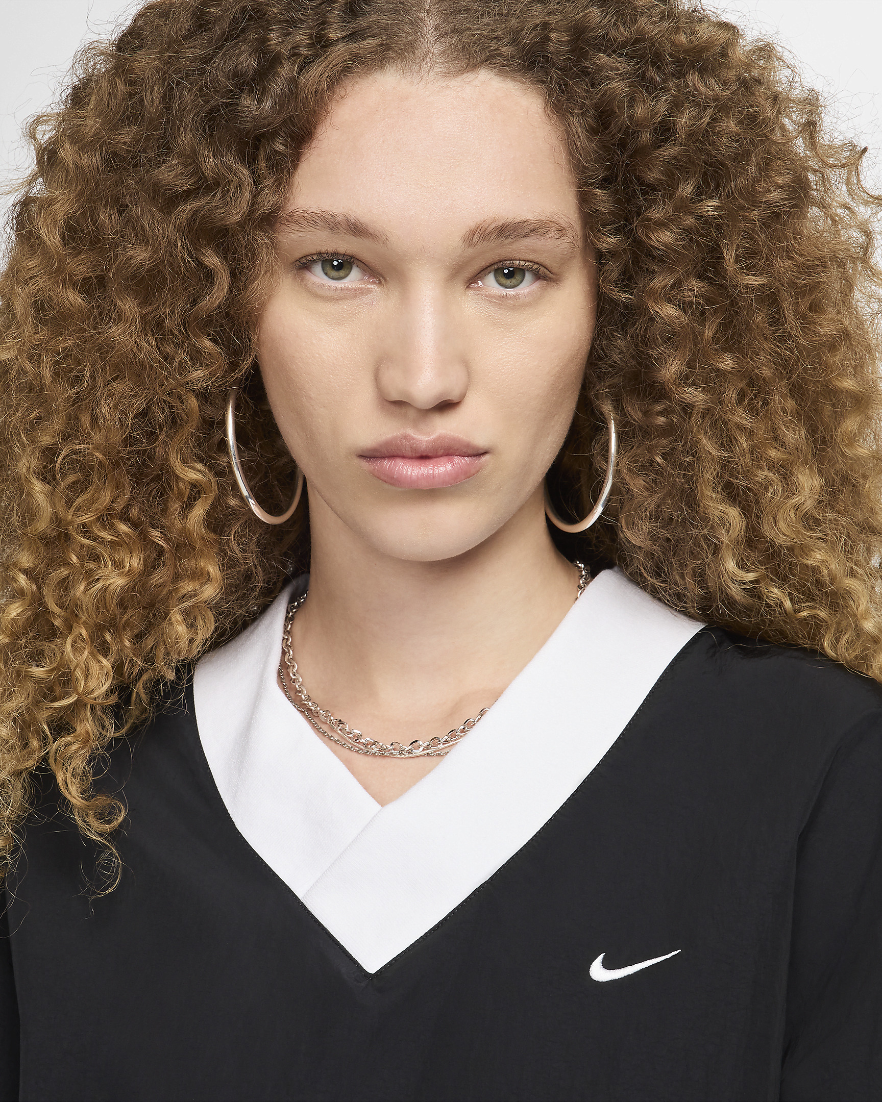 Nike Sportswear Essential Women's Loose UV Woven Long-Sleeve V-Neck Top - 3