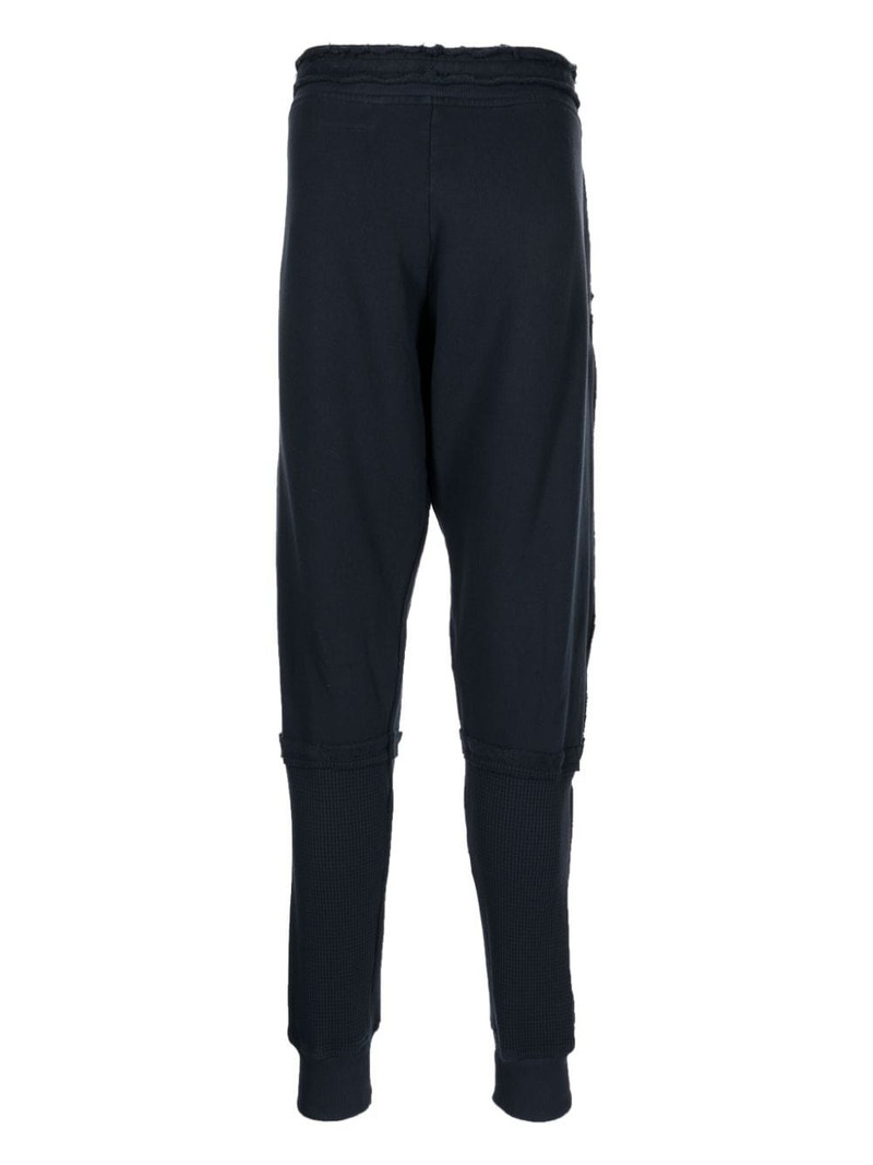 Greg Lauren stretch-cotton drawstring-waistband track pants outlook