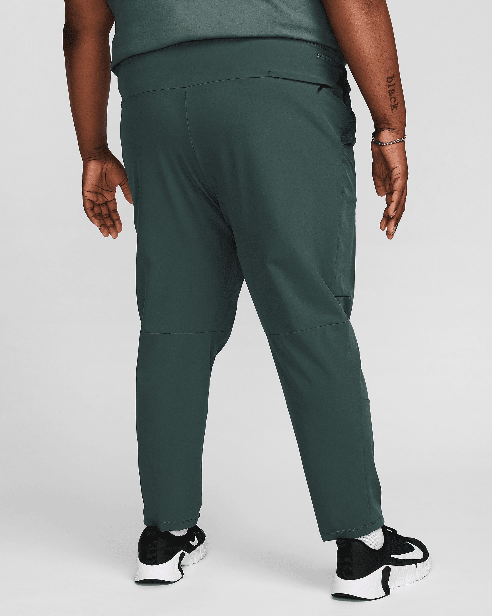 Nike Unlimited Men's Dri-FIT Tapered Leg Versatile Pants - 8