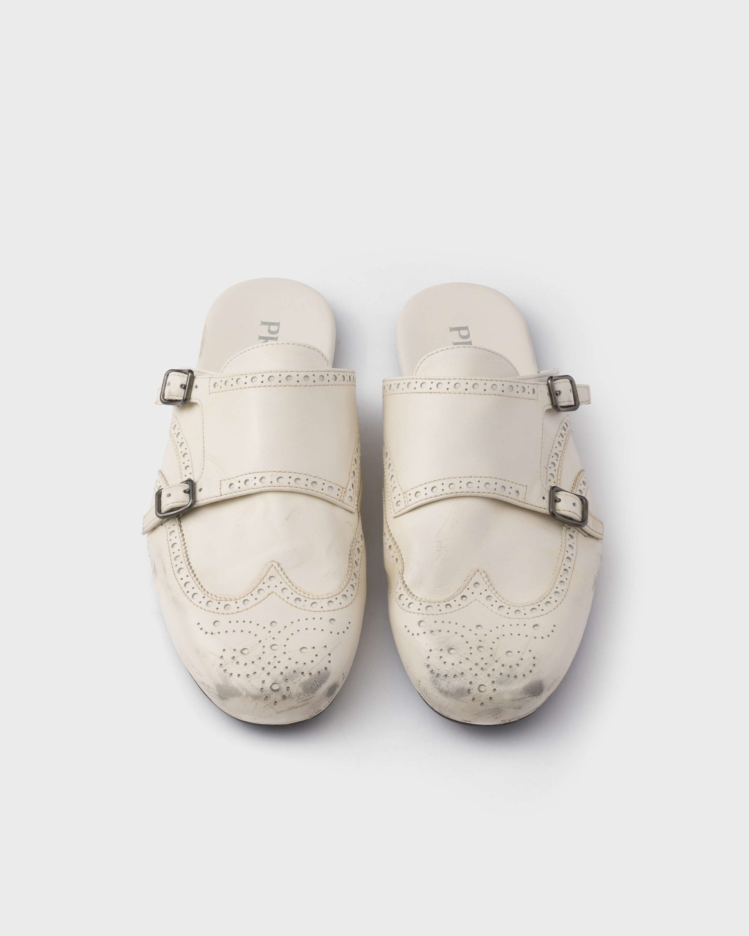 Prada Shuffle antiqued leather double monk strap mules