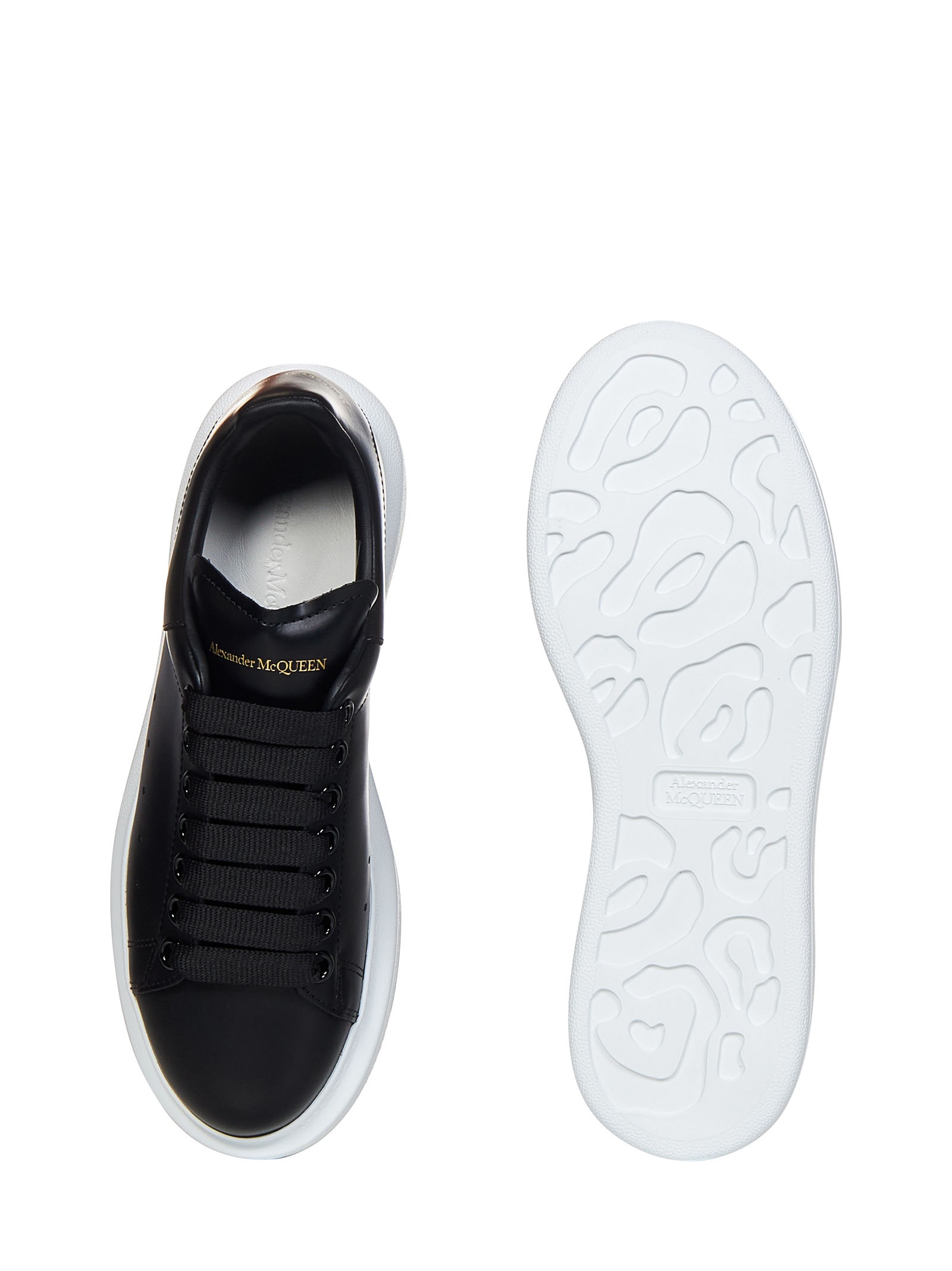 Black sneakers in smooth calfskin with oversized rubber sole and gold signature. - 4