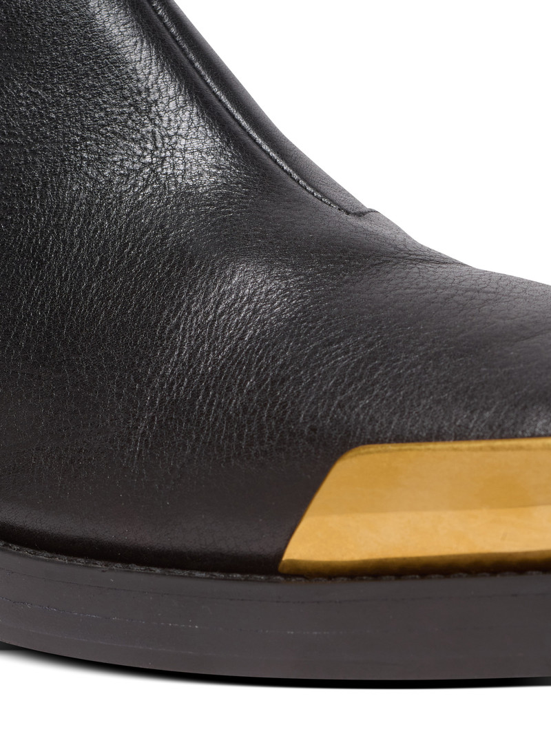 Square-toe boots in textured leather 6