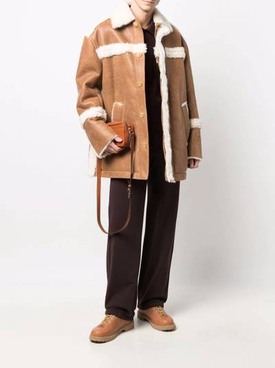 JACQUEMUS fur-trimmed concealed coat outlook