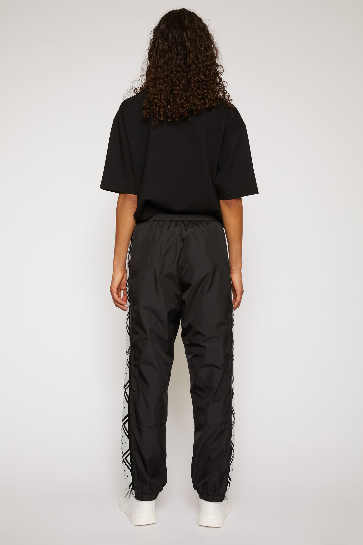 Face motif stripe track pants black - 5