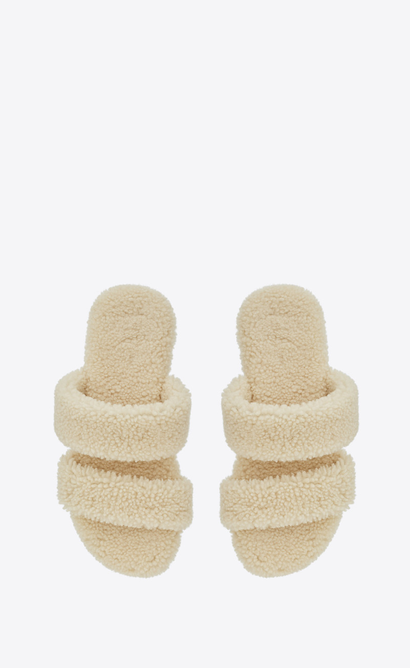 SAINT LAURENT bleach slides in shearling outlook