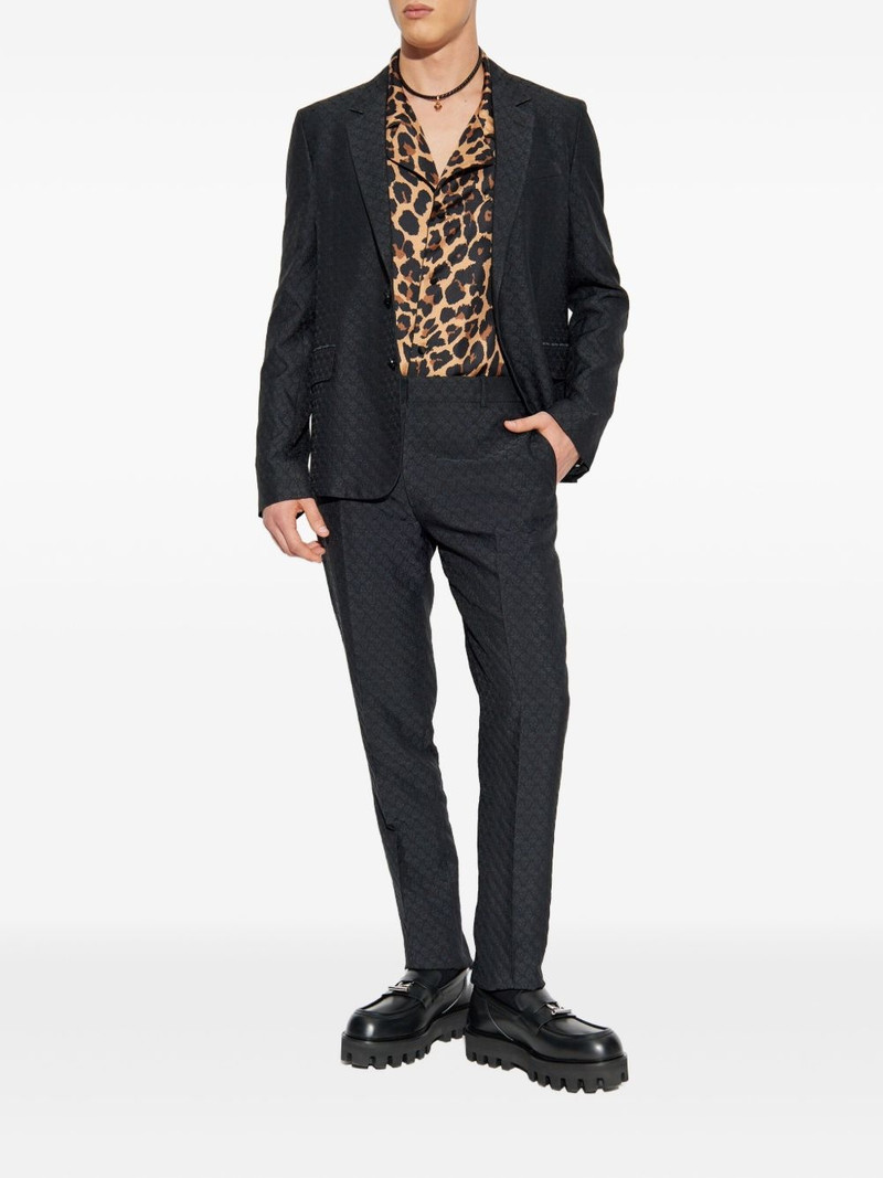 Alexander McQueen skull-pattern trousers outlook
