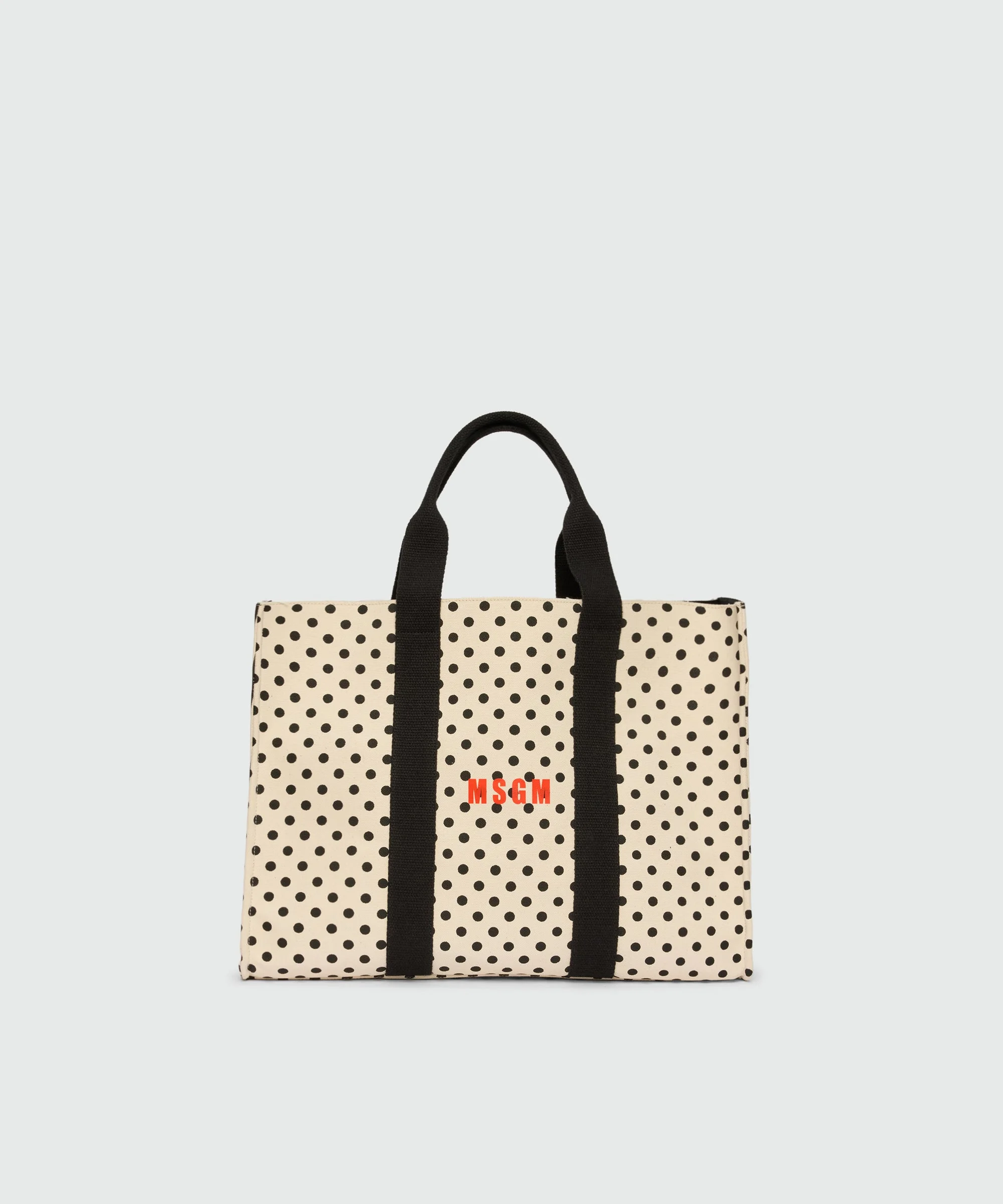 Horizontal canvas tote with polka dot print. - 1