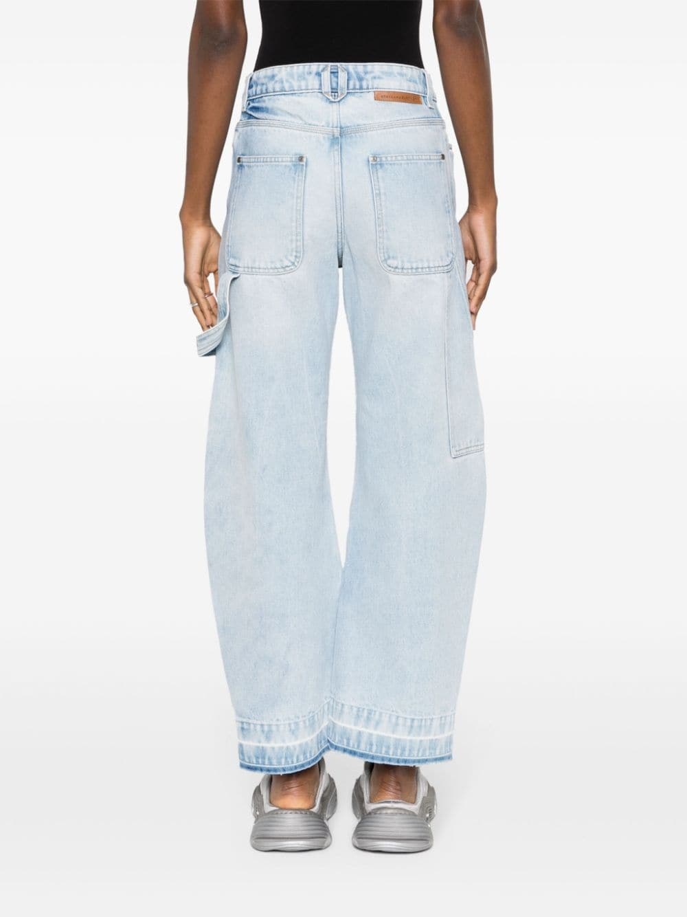 mid-rise tapered-leg jeans - 4