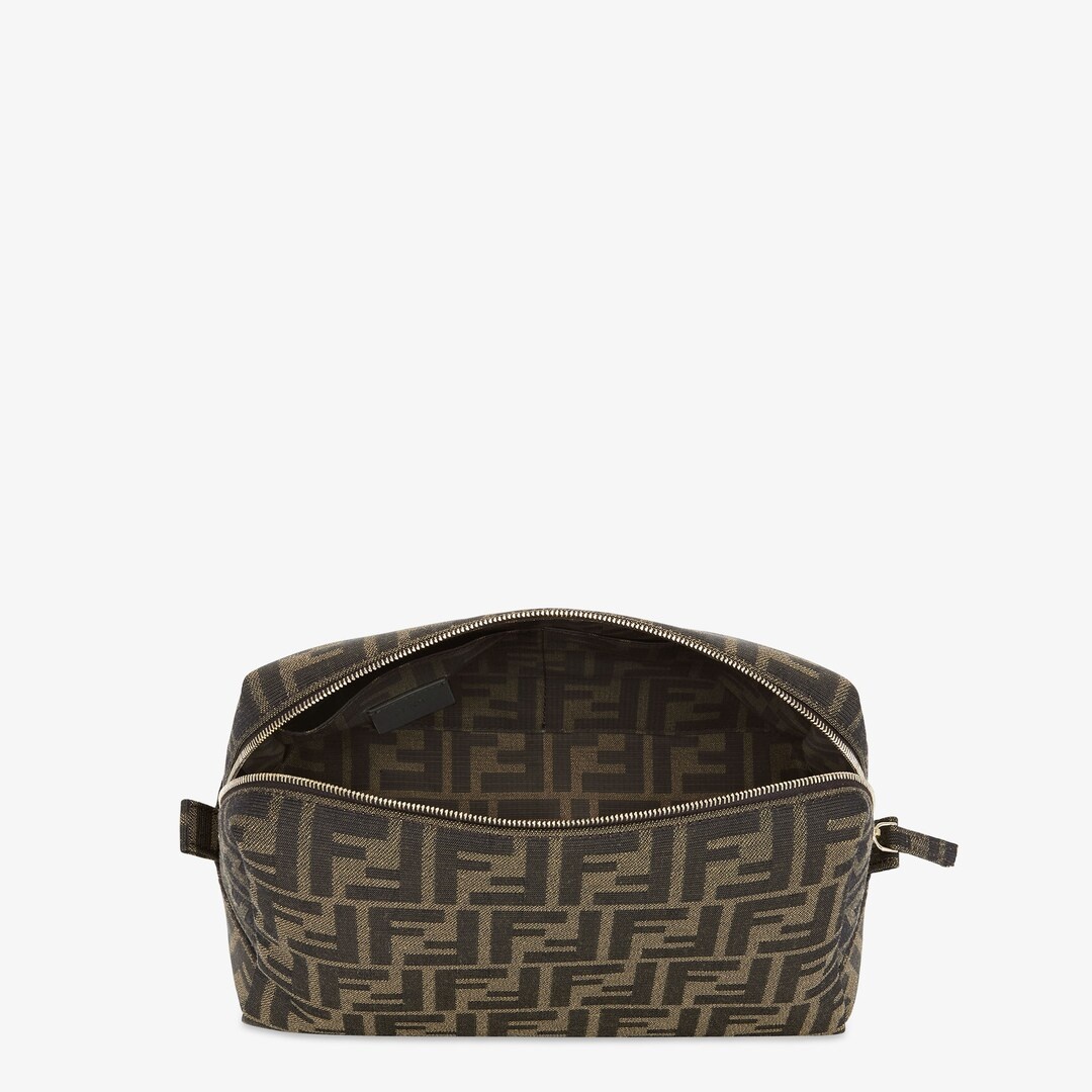 Medium toiletry case with zip fastening and inside pocket. Made of fabric with iconic brown jacquard - 3