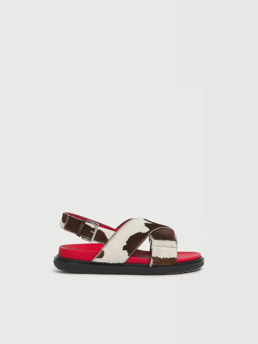 WHITE AND BROWN COW-PRINT PONYHAIR FUSSBETT - 1