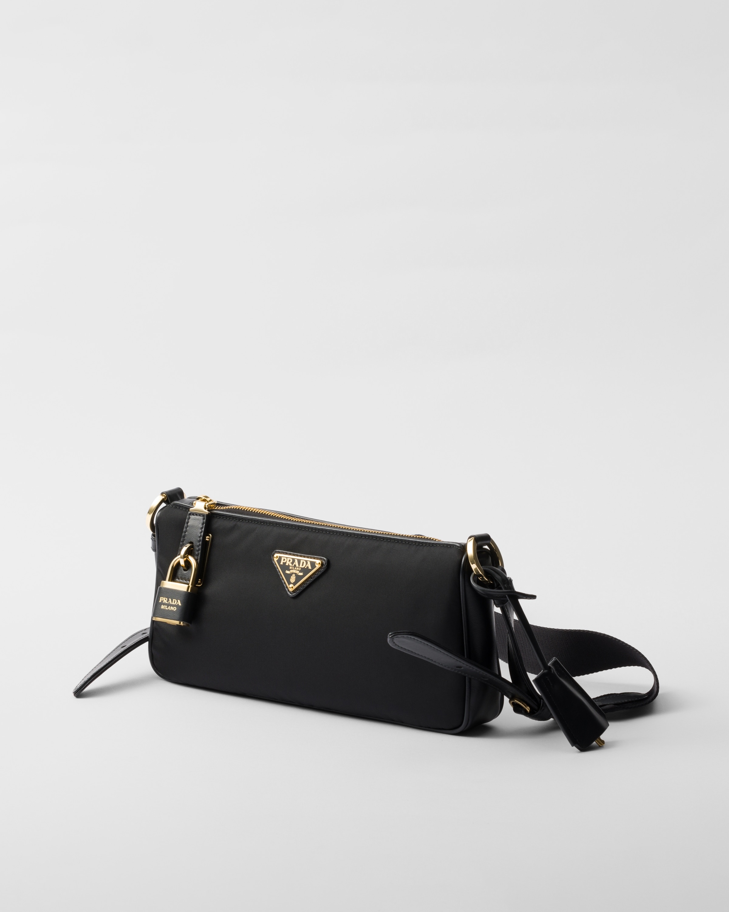 Prada Small Re-Nylon and leather shoulder bag | REVERSIBLE