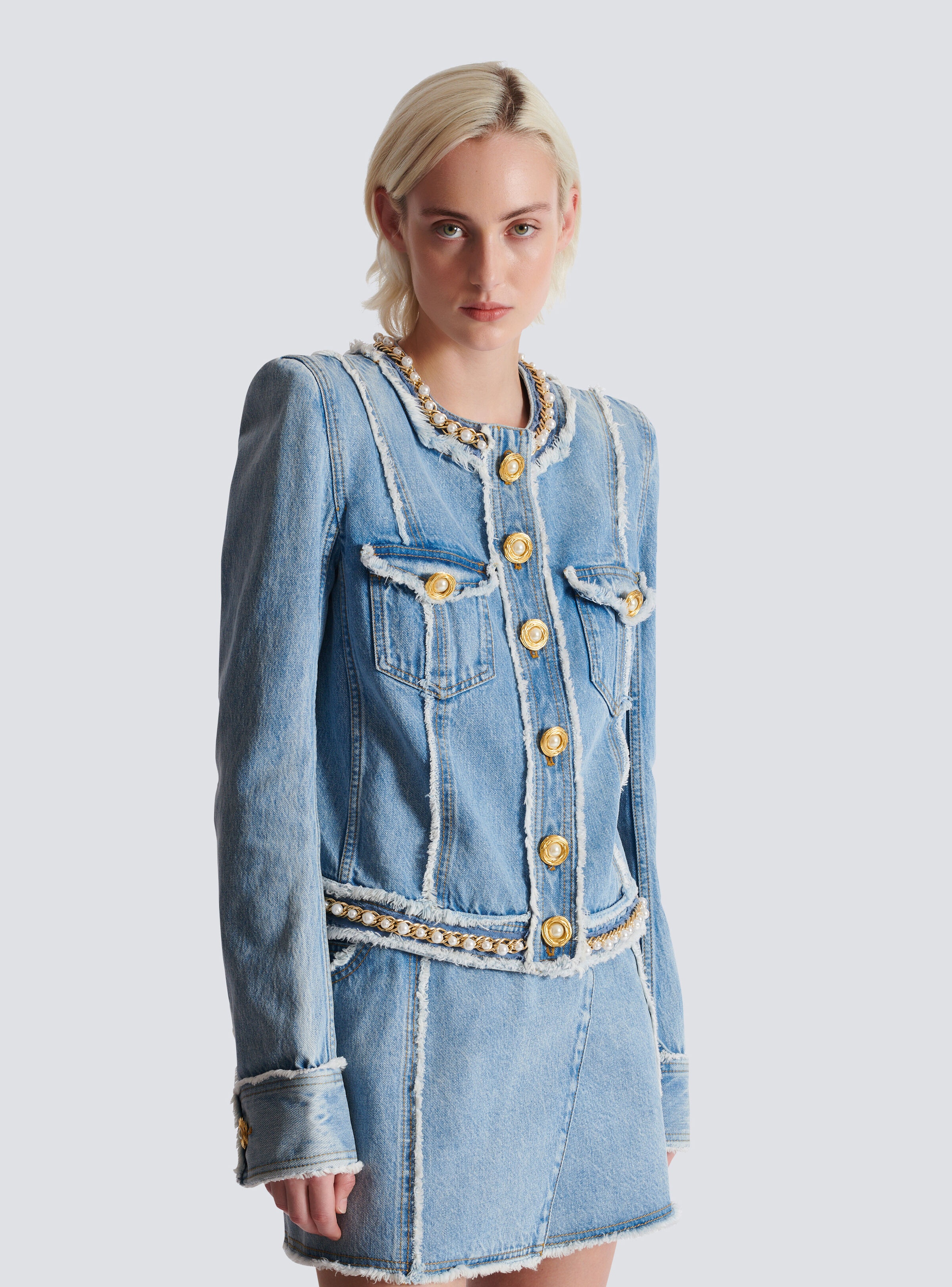 Denim jacket with pearl trim - 7