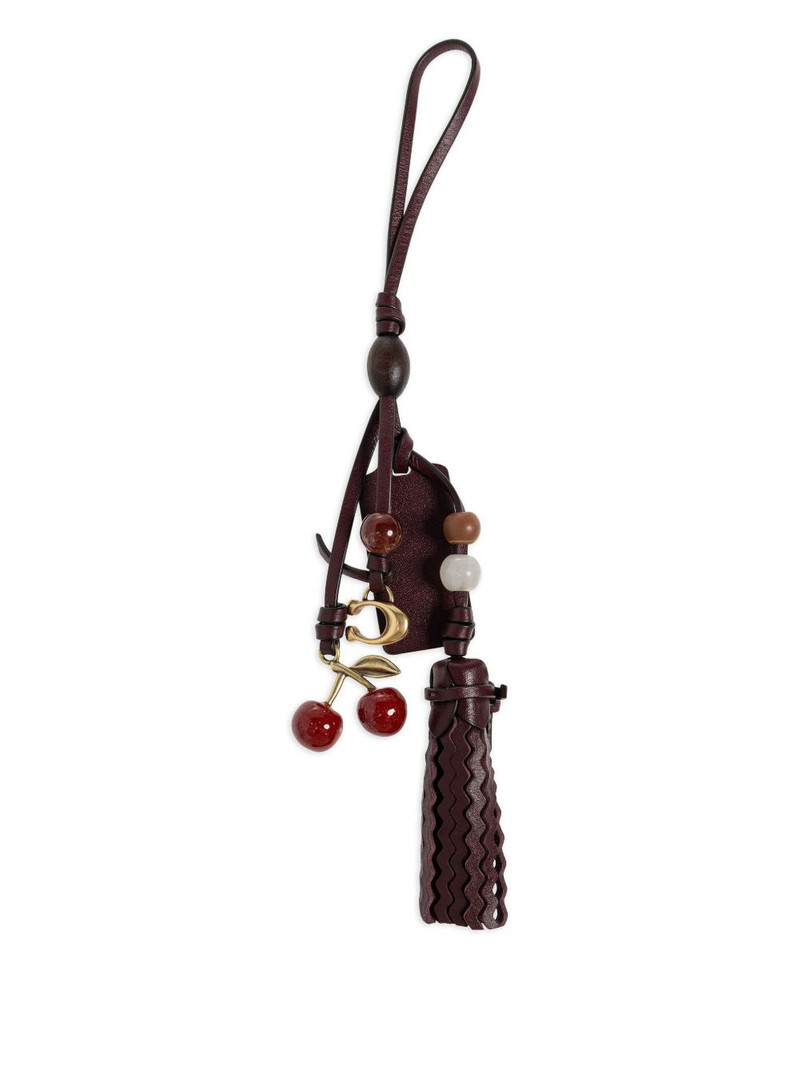 COACH logo-engraved leather bag charm outlook