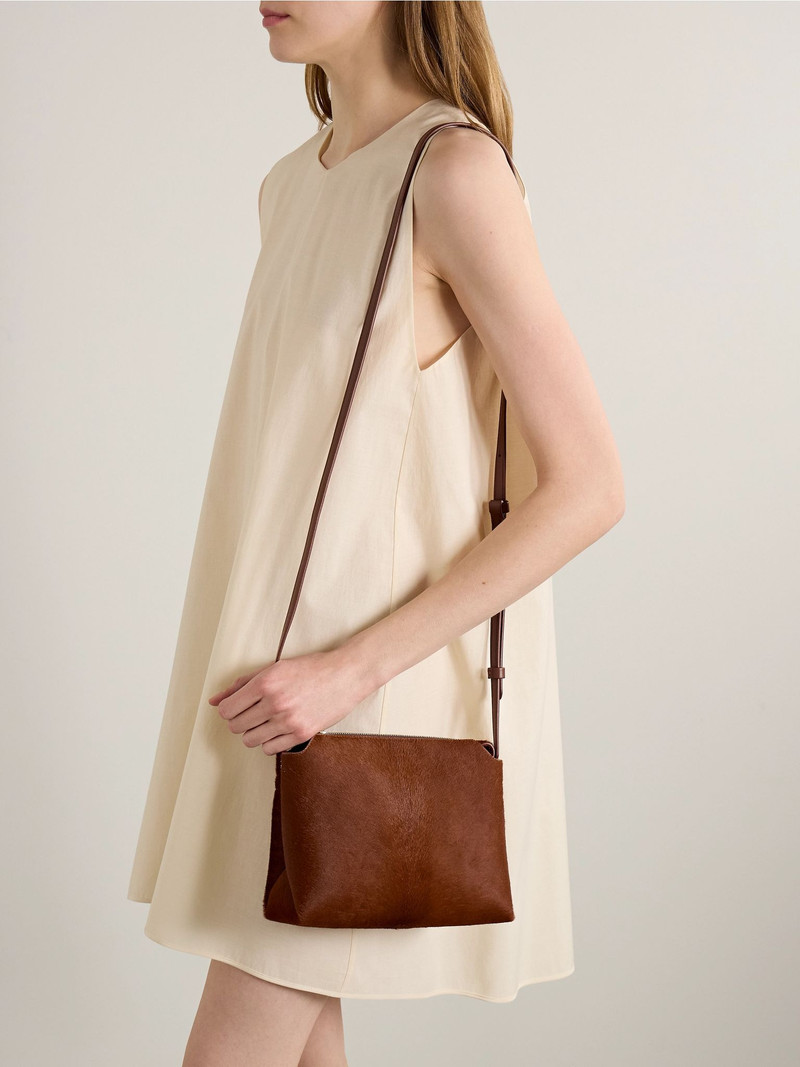 KHAITE Lina medium calf hair shoulder bag Brown outlook