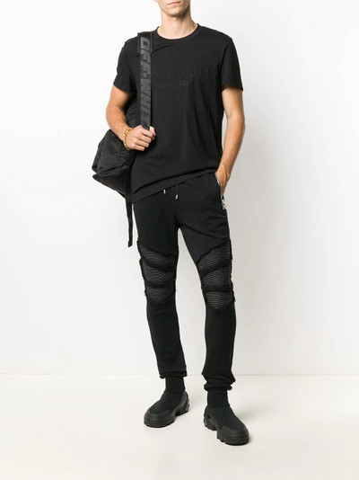 Balmain ripped knees track pants outlook