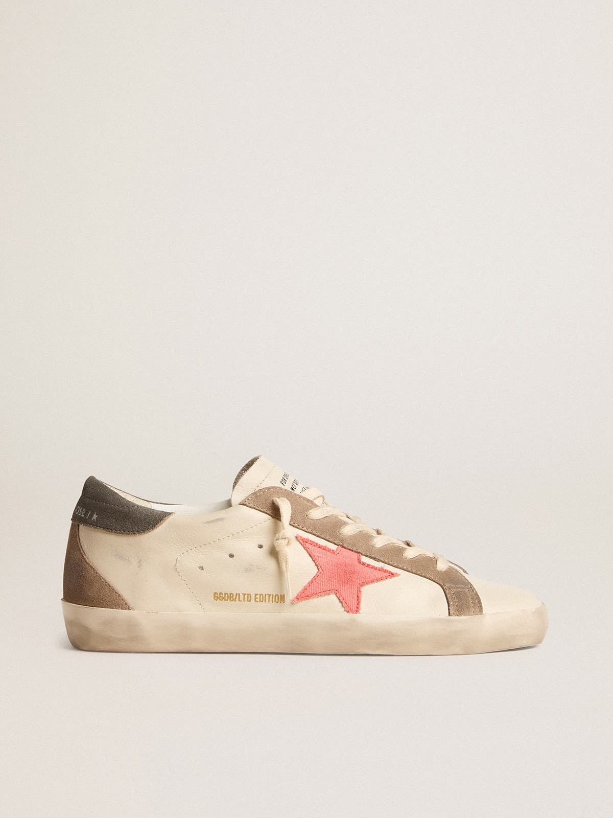 Super-Star LTD with pink gabardine star and gray suede heel tab - 1