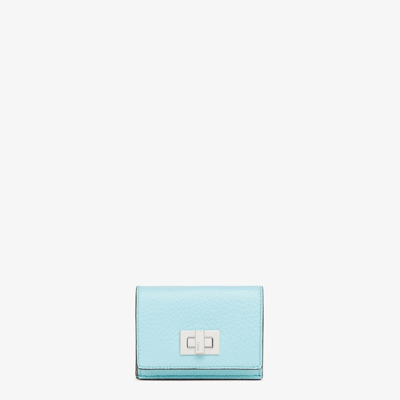 Compact, tri-fold Peekaboo wallet with large internal bill compartment and three concealed card hold 1