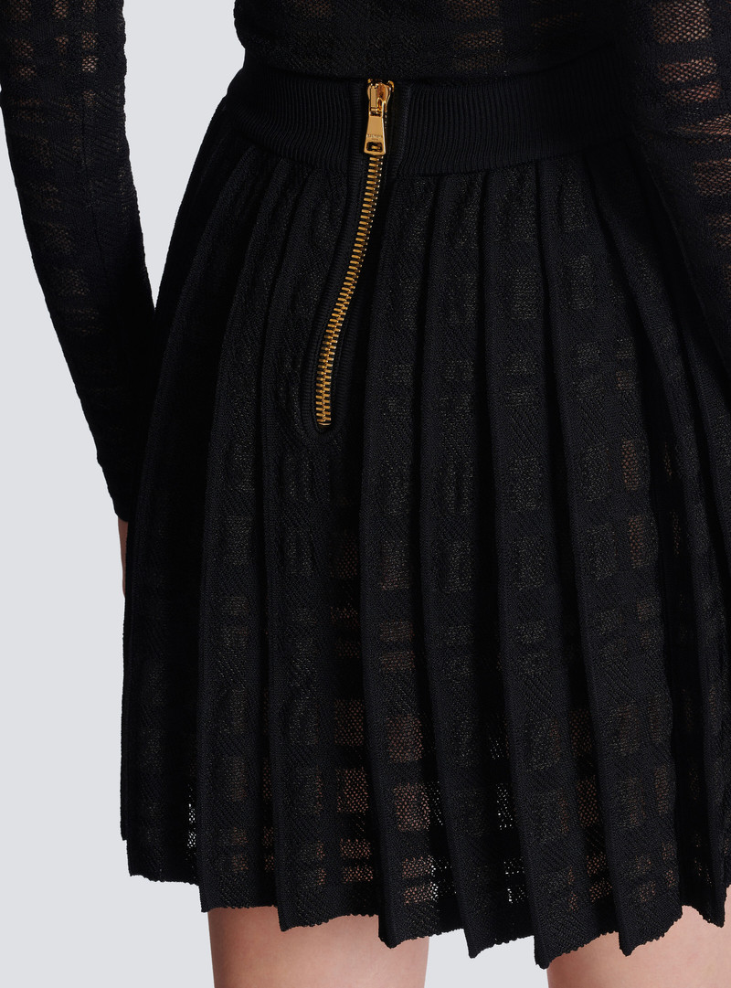 Short pleated skirt in plaid knit 6