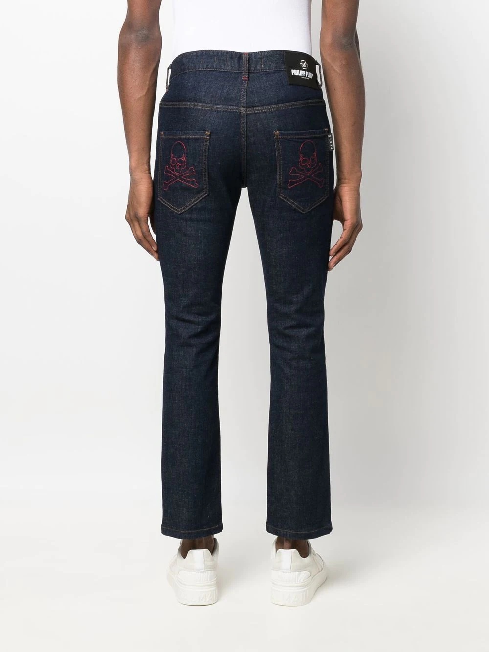 skull-embroidered skinny jeans - 4