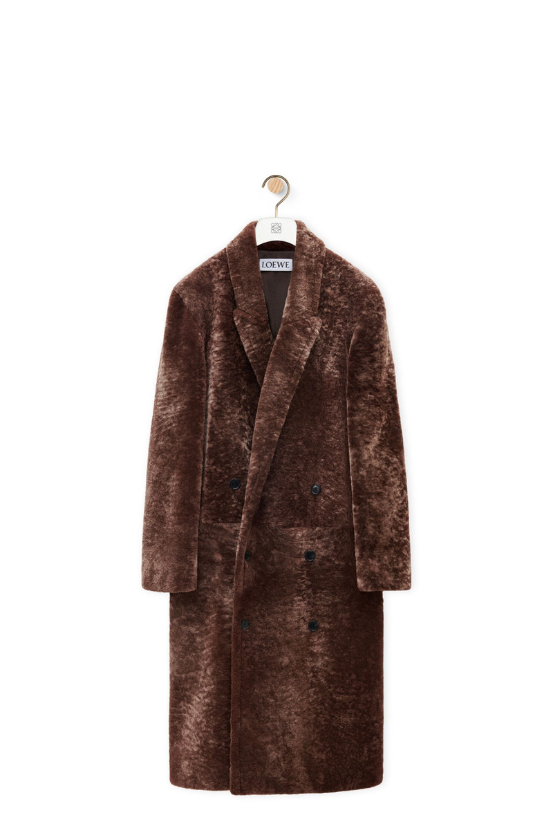 Double-breasted coat in shearling 1