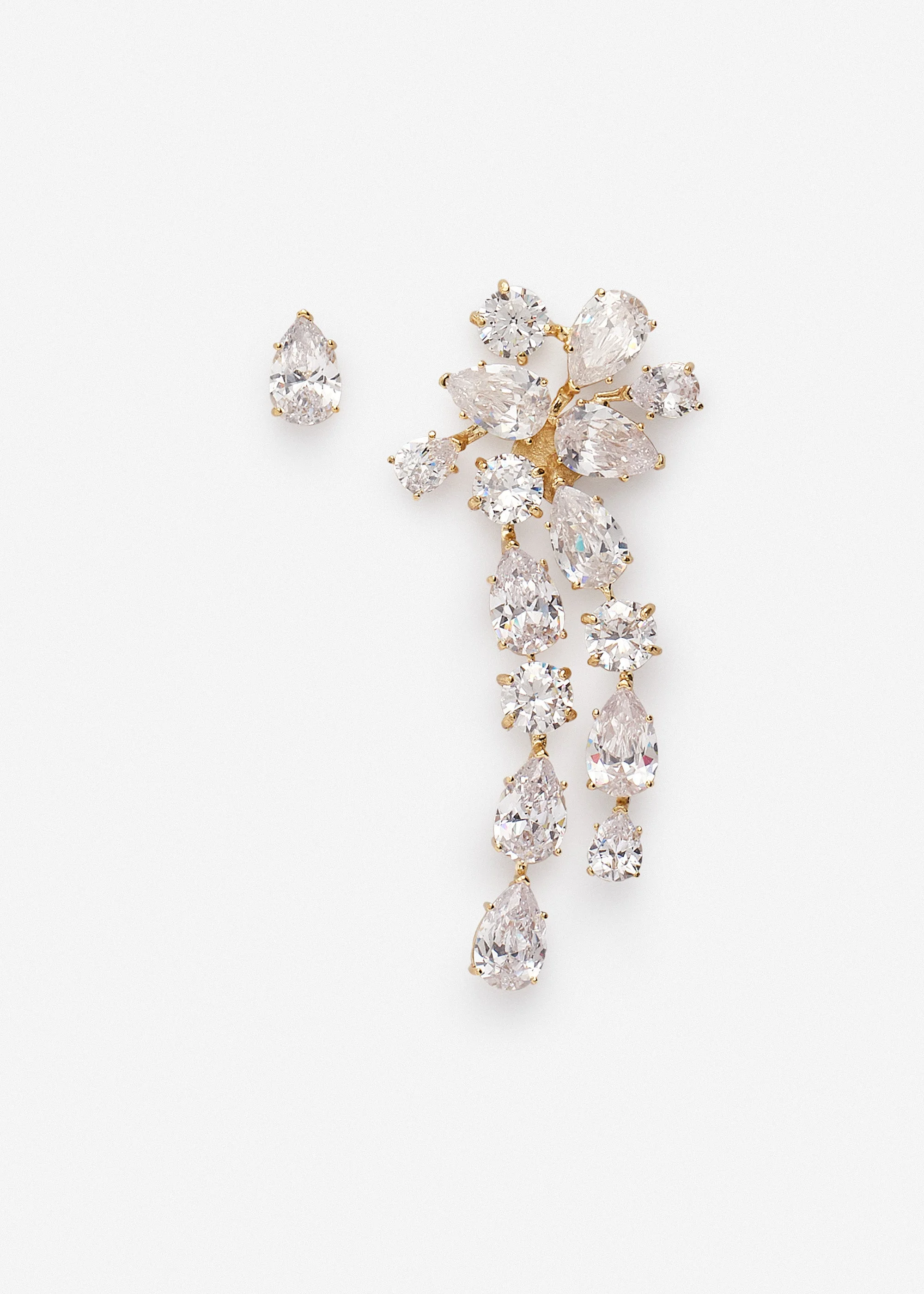 Asymmetric crystal cascade earrings in gold - 1