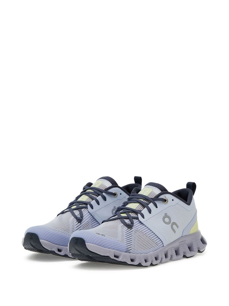 On logo-print sneakers outlook