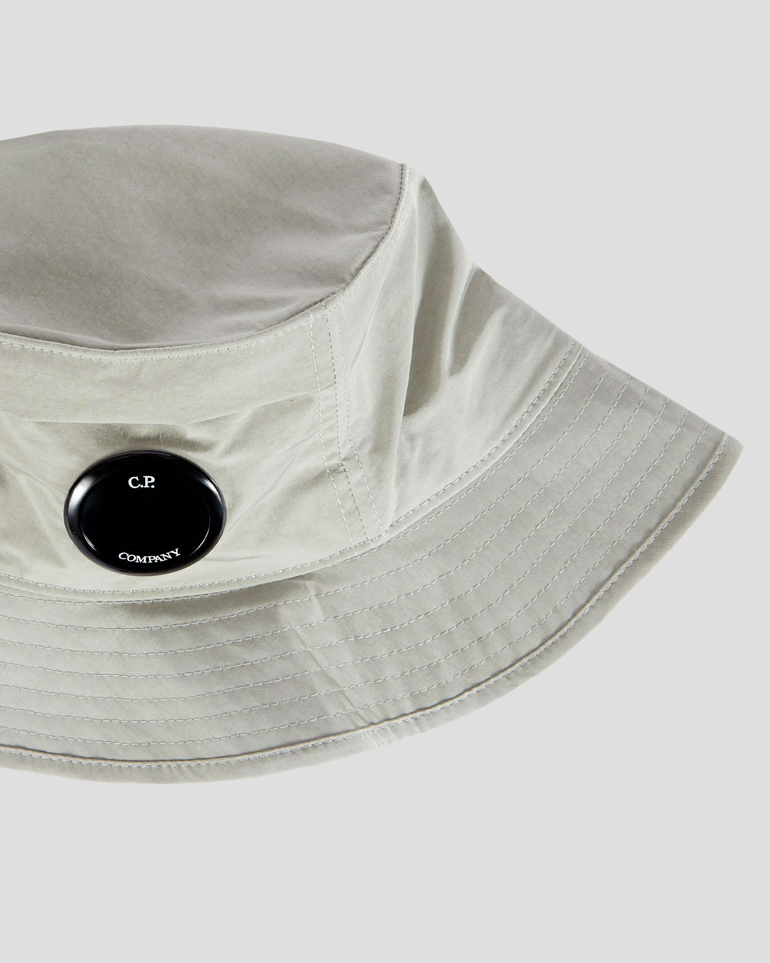 帽子 C.P Company Chrome-R Lens Bucket Hat C.P. Company Chrome-R Lens Bucket Hat | REVERSIBLE