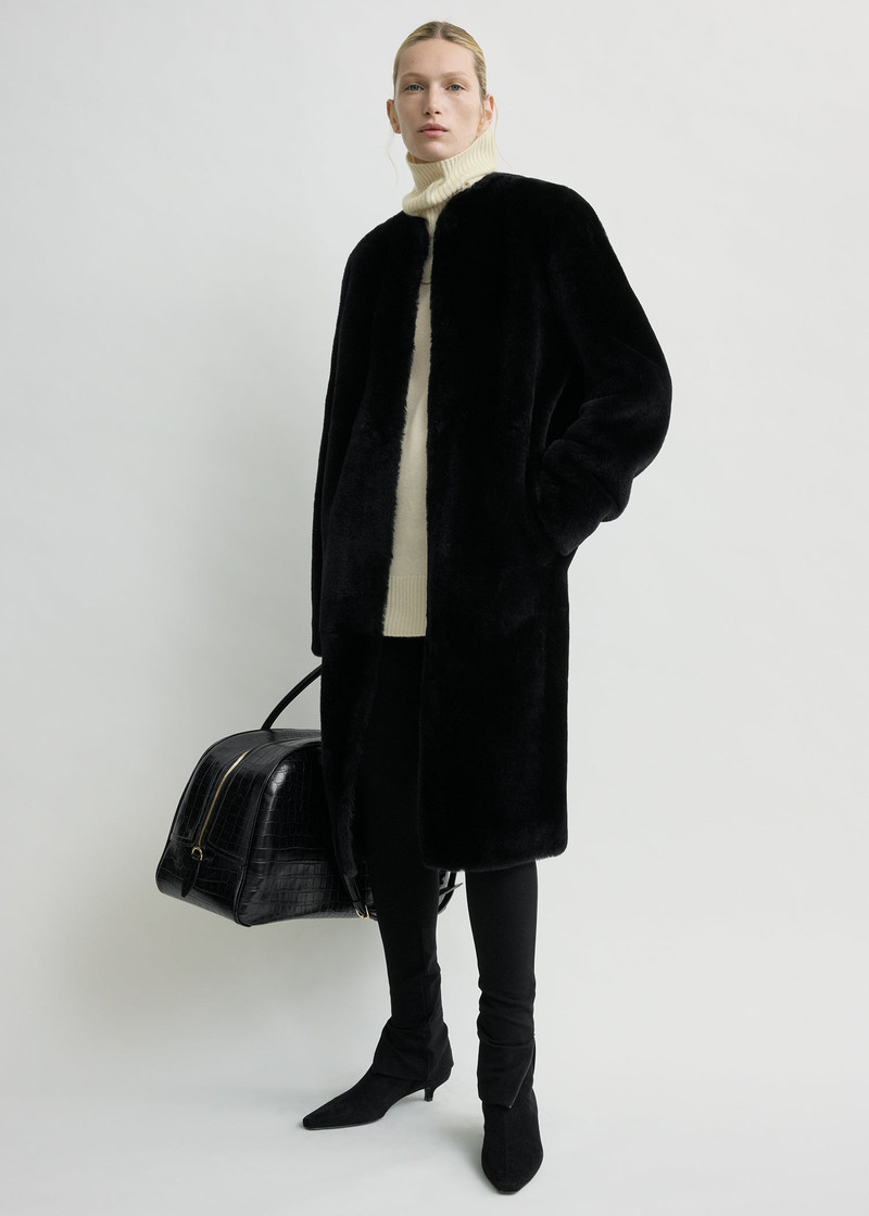 TOTEME Shearling midi coat black outlook