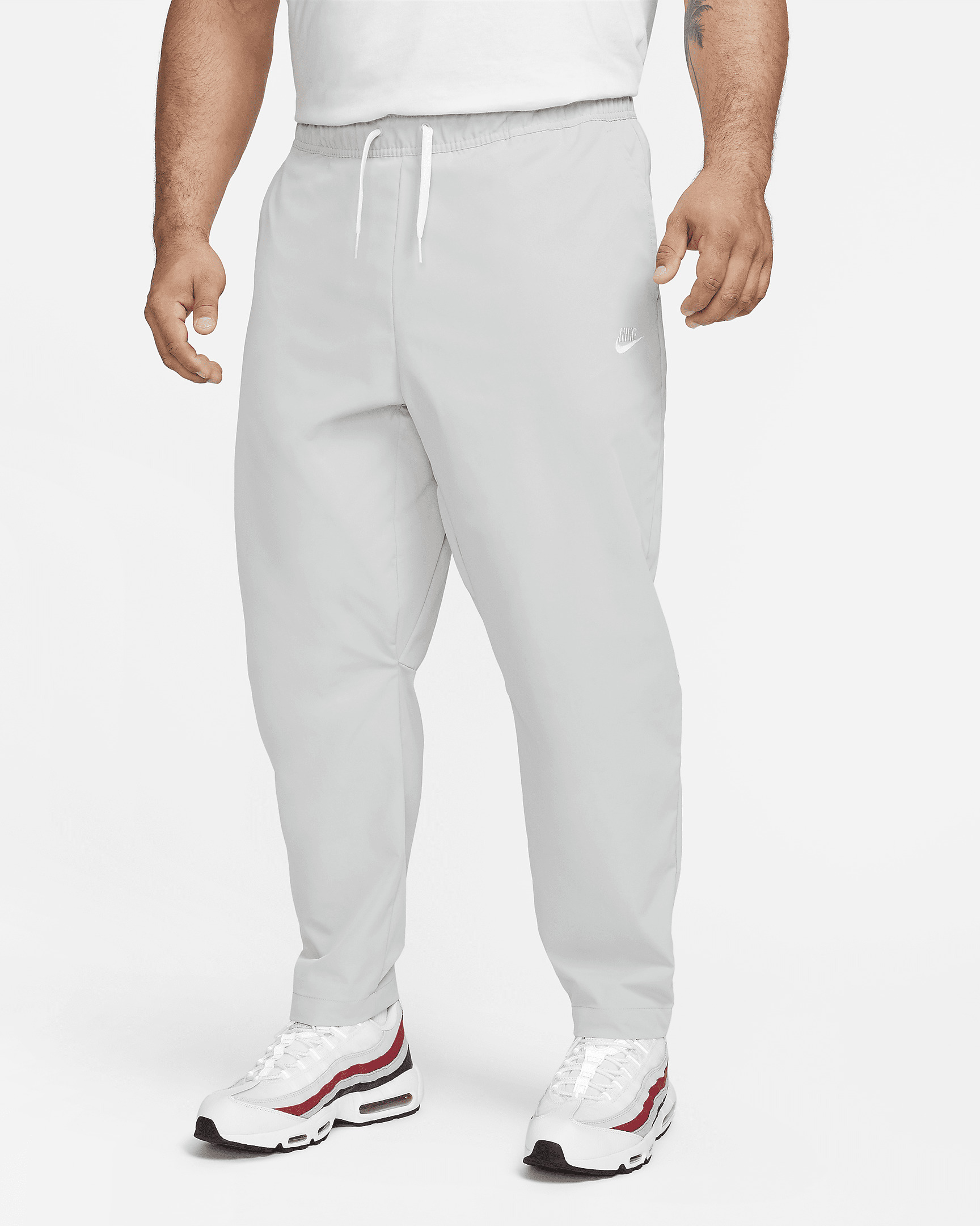 Nike Club Men's Woven Tapered Leg Pants - 7