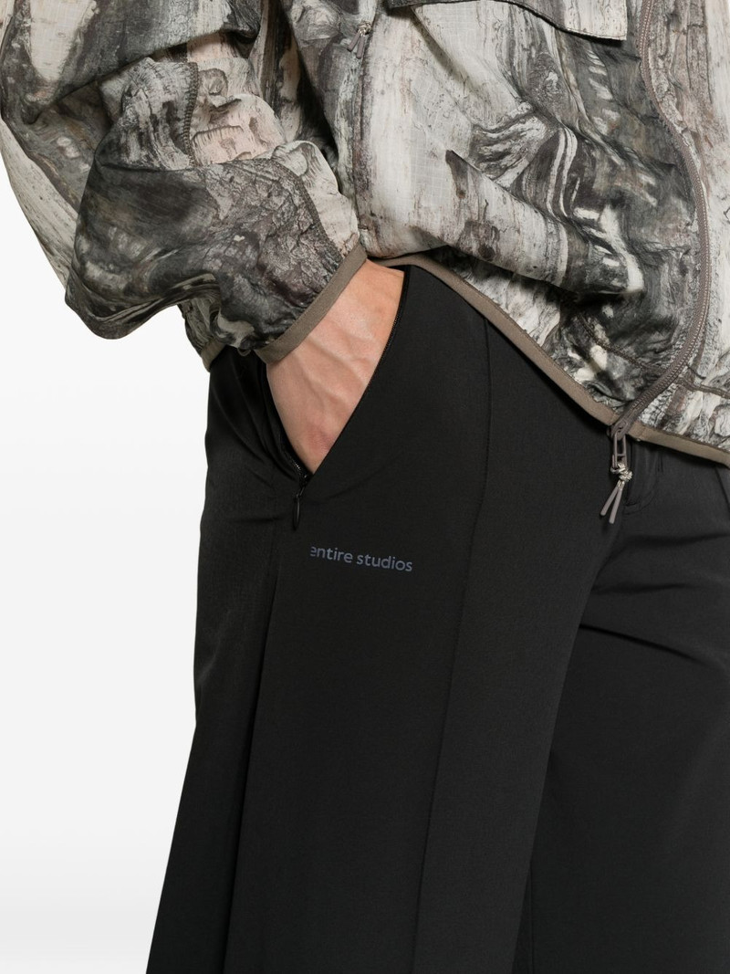 x entire studios Z.N.E. logo-print wide-leg trousers 5