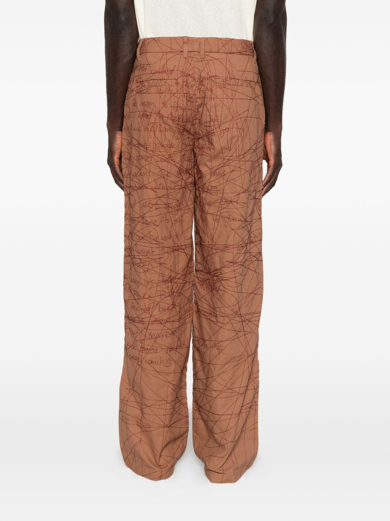 embroidered scribble-pattern trousers 4