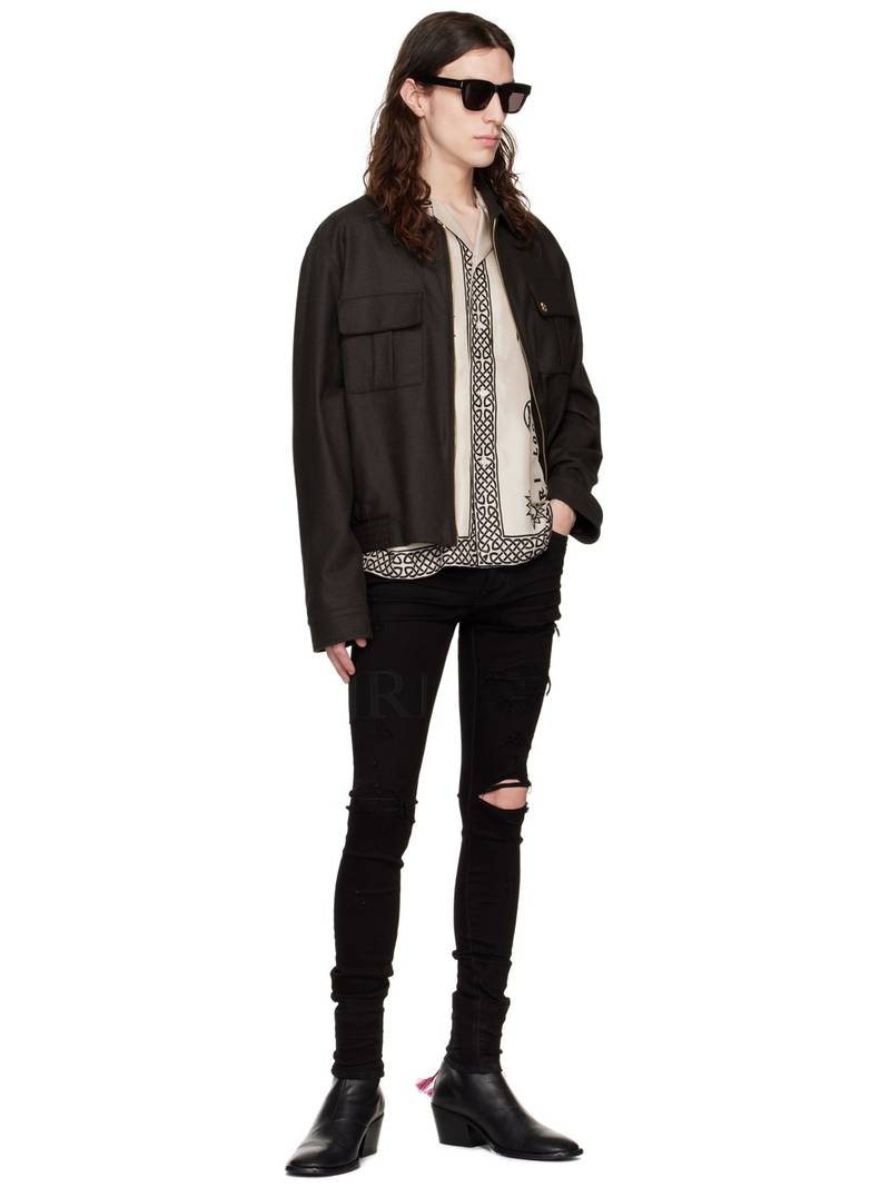 AMIRI distressed-finish slim-cut jeans outlook