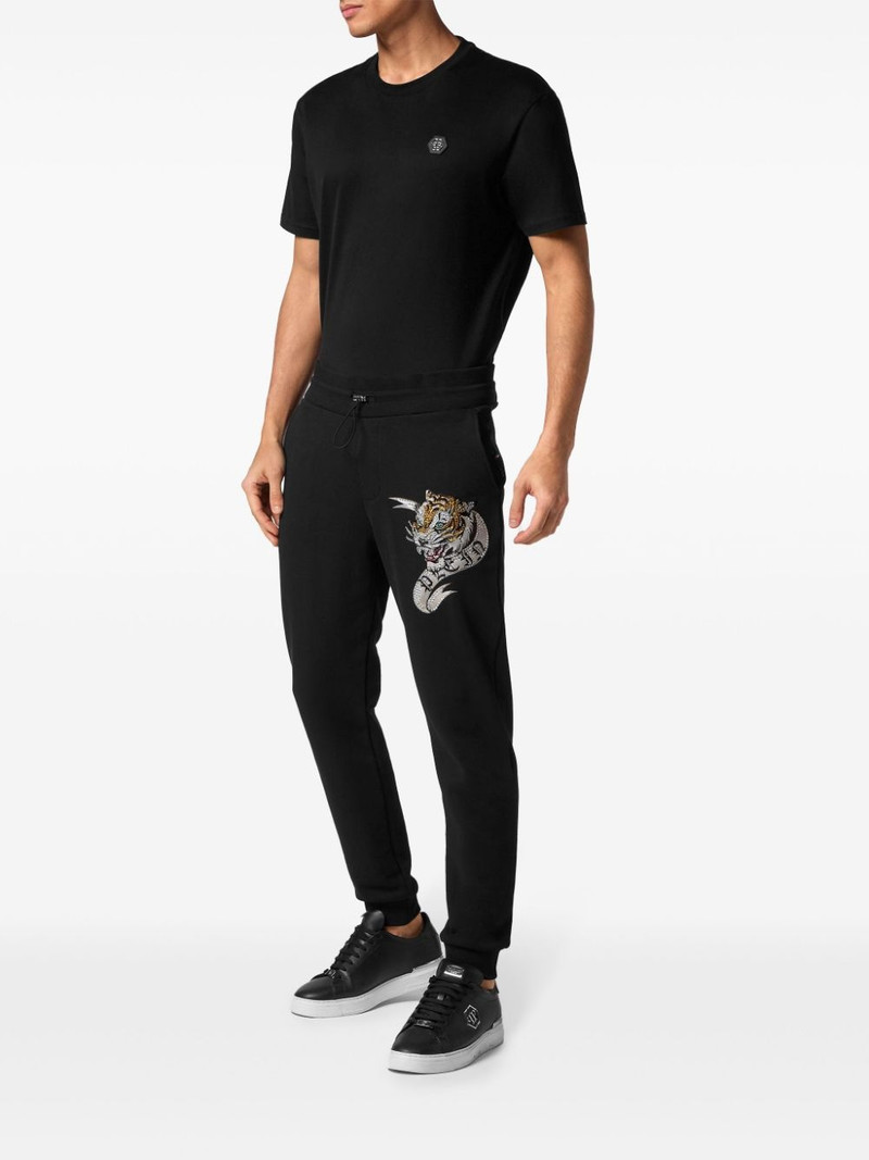 PHILIPP PLEIN tiger-appliquÃ© drawstring track pants outlook