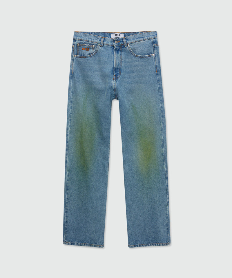 Medium-wash denim trousers with localized distressing, five-pocket design 1