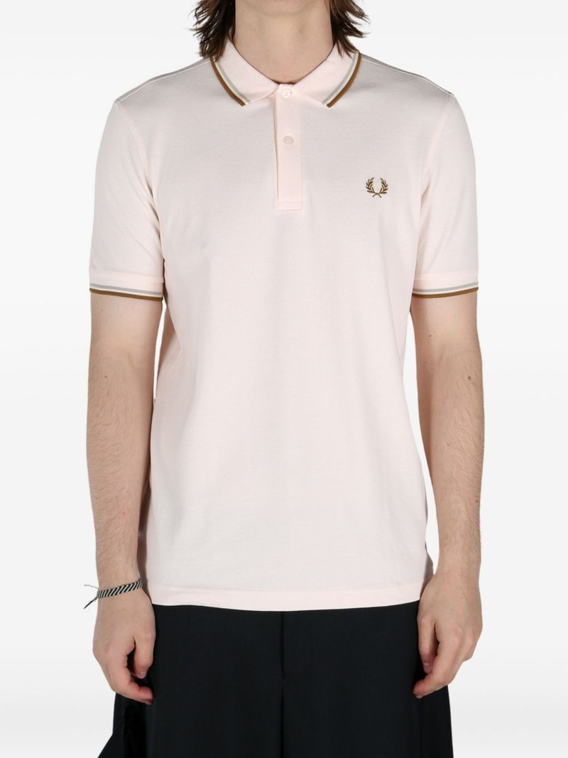 Comme des Garçons SHIRT x Fred Perry Freedom Is Energy polo shirt outlook
