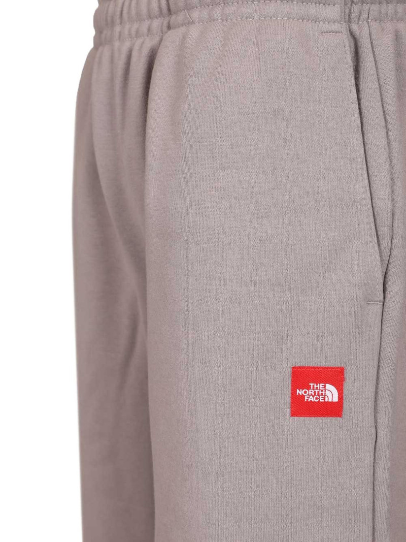 Red Box logo-patch trousers 4