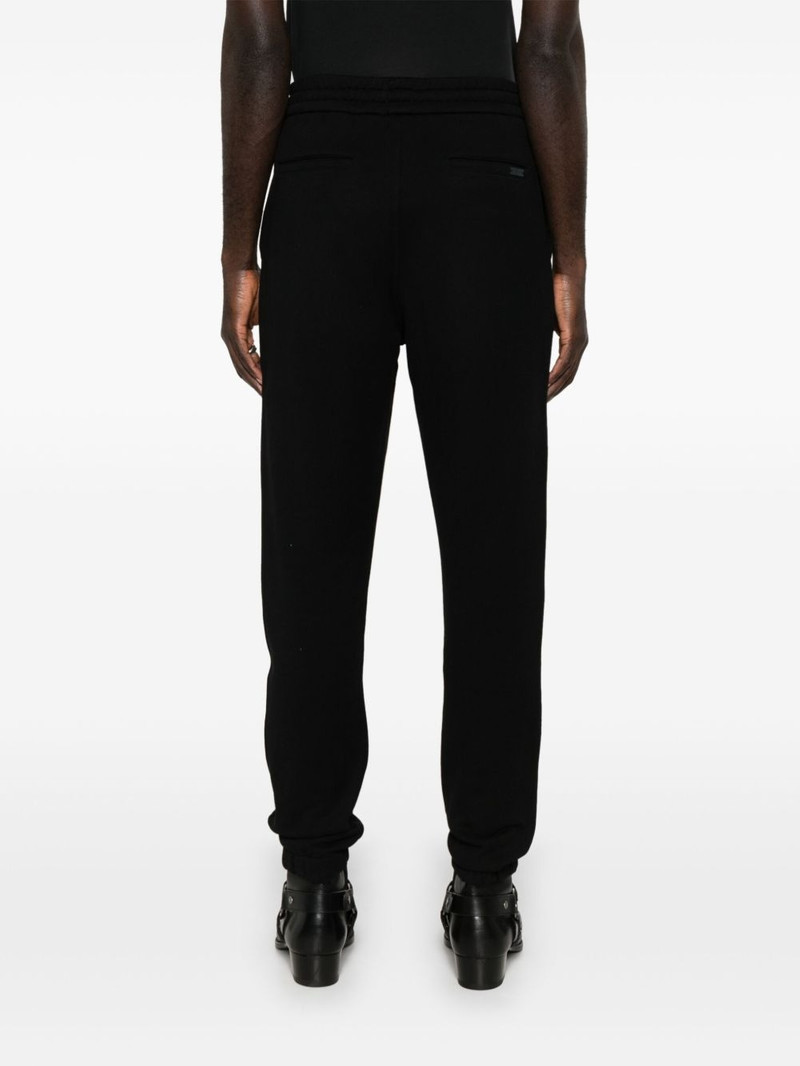 Cassandre-logo track pants 4