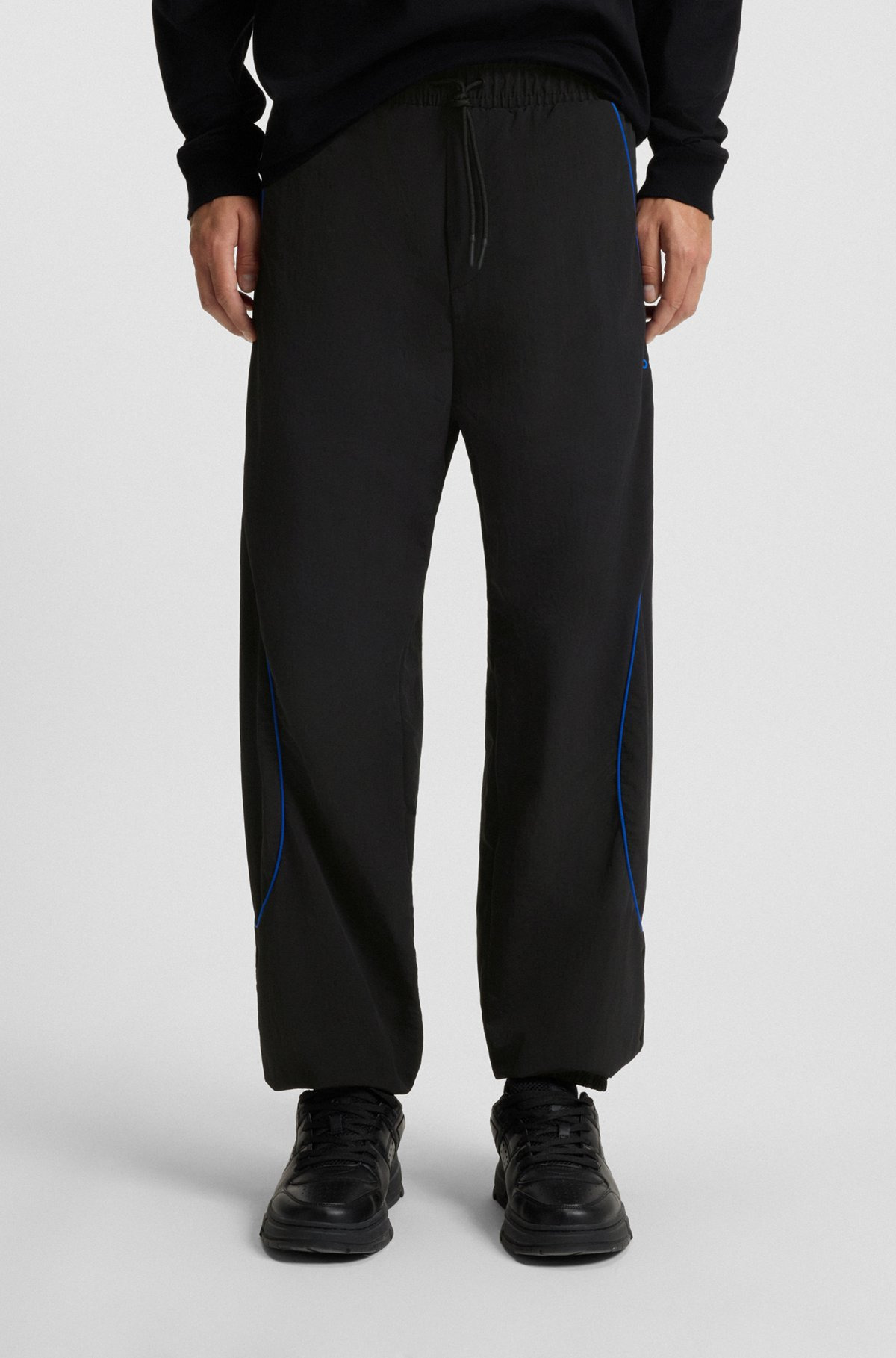 WATER-REPELLENT TROUSERS WITH LOGO AND PIPING - 4